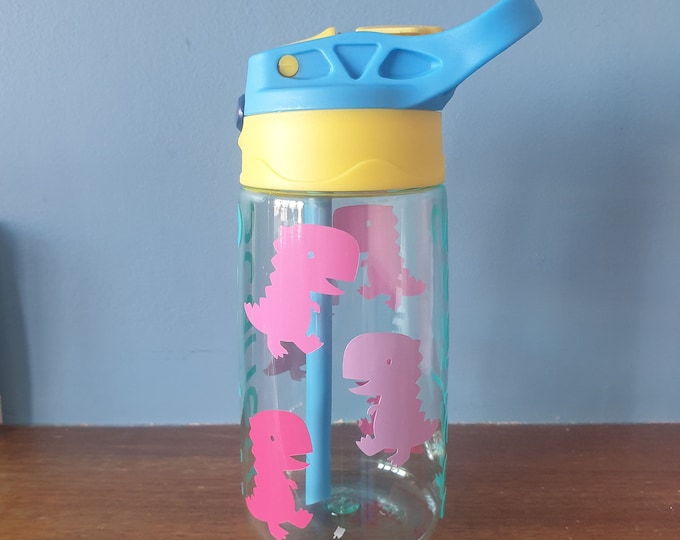 T-rex Kids 480ml pop up spout water bottle with handle personalised with a vinyl name and colourful T-rex design.BPA free.