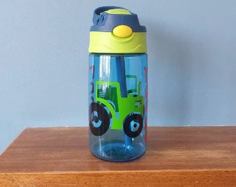 Kids 480ml drinks bottle with pop up spout, handle and personalised with a name and Tractor design.