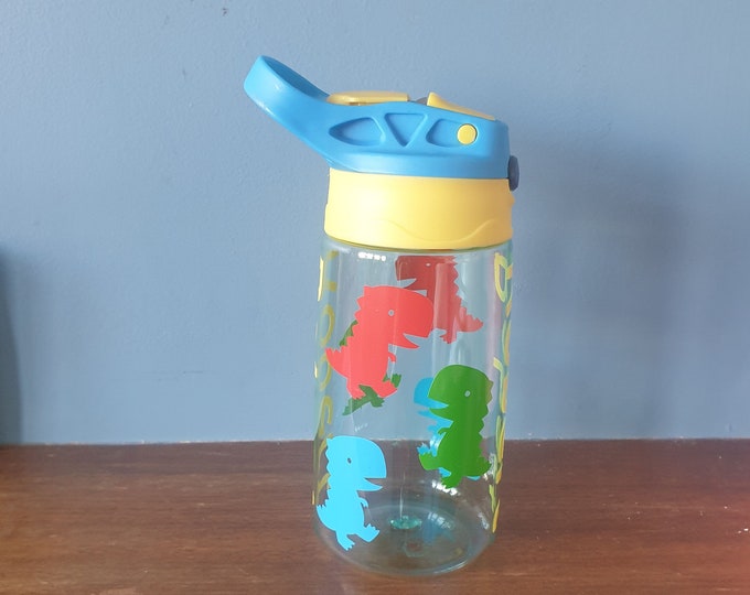 T-rex Kids 480ml pop up spout water bottle with handle personalised with a vinyl name and colourful T-rex design.BPA free.