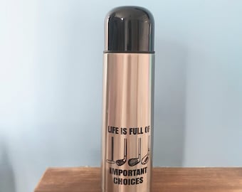 Golf themed Thermos Flask and cup with the wording 'Life is full of important choices'