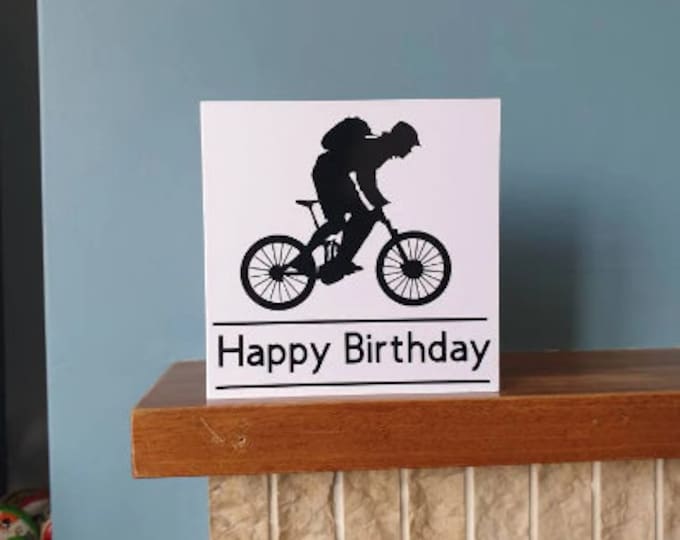 A handmade cut out design Mountain biking / Mountain bike Birthday greetings card. Ideal for all sports lovers!