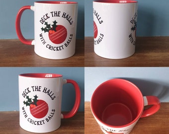 Cricket mug with lovely Christmas themed design. Deck the halls with Cricket balls