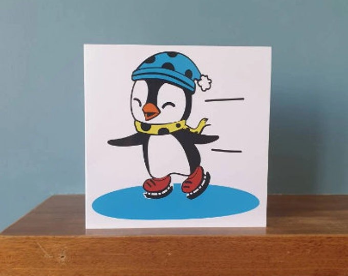 A handmade cut out design Ice Skating penguin Birthday / greetings card.