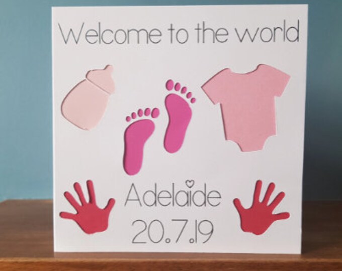 Lovely handmade cut out design New Baby card which can be personalised with a name and birth date. Boy, Girl, christening, new arrival