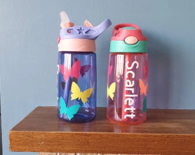 A 480ml Leak-Proof BPA-Free Tritan Kids  Water Bottles with Straw and Handle personalised with a name and a butterfly design in vinyl.