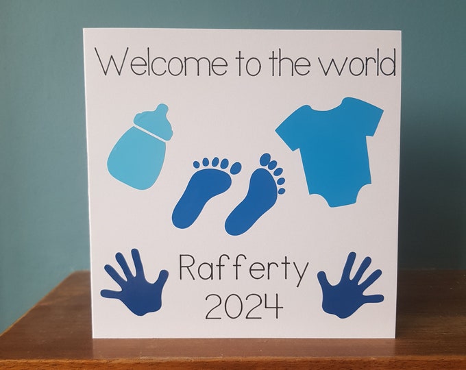 Lovely handmade cut out design New Baby card which can be personalised with a name and birth date. Boy, Girl, christening, new arrival