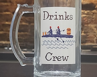 Rowing beer mug with lovely rowers themed design and the wording 'Drinks Crew'.