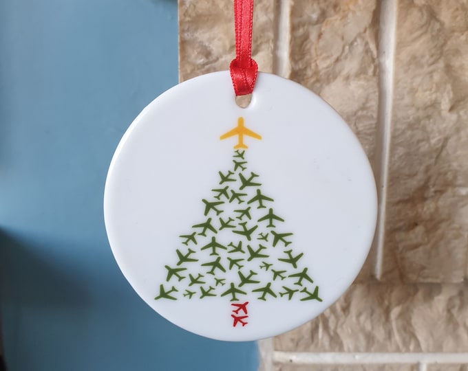 Airplane ceramic tree decoration with lovely aircraft themed design.