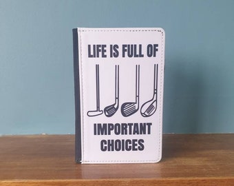 Golf themed passport cover with the wording 'Life is full of important choices'