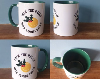 Tennis mug with lovely Christmas themed design. Deck the halls with Tennis balls