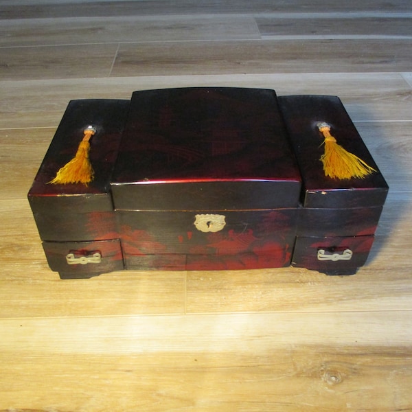 Vintage Oriental Black and Red Laquer Jewelry Box also a Music Box 1950's