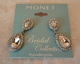 Vintage Monet Bridal Collection faux diamond drop earrings. These dangle earrings are very sparkly and originally cost 22 dollars.