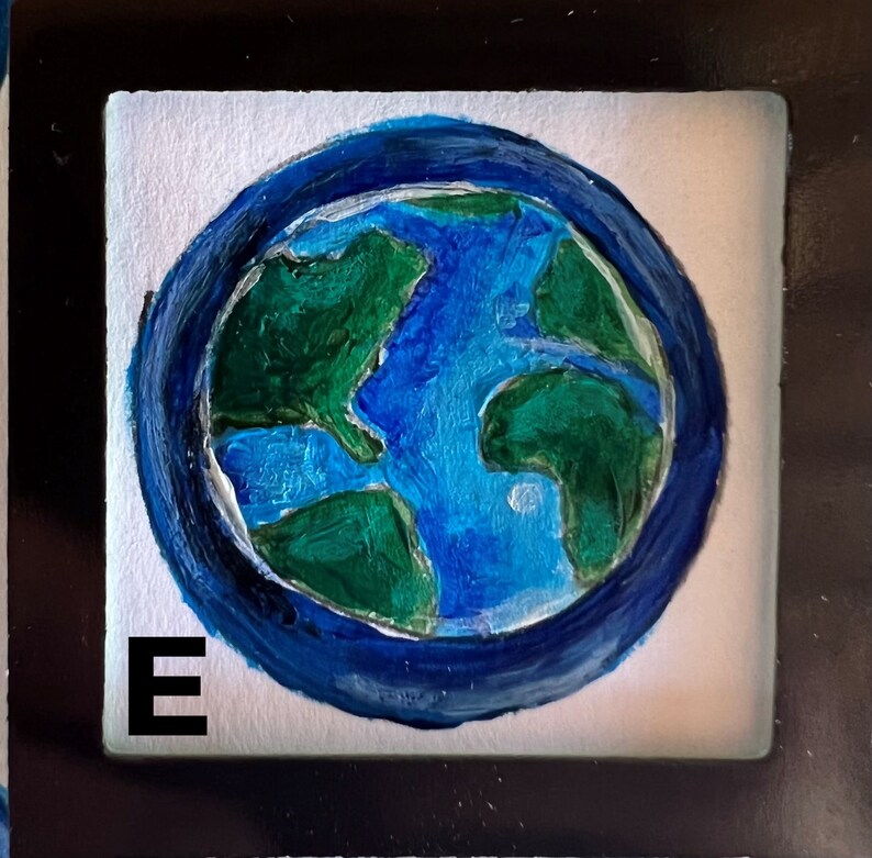 May include: A hand-painted blue and green globe with a white background and the letter "E" in the bottom left corner.