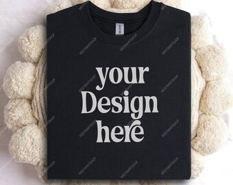 May include: A black t-shirt with the text "your Design here" printed in white on the front.