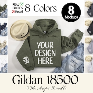Pode incluir: Oito maquetes de um moletom com capuz Gildan 18500 em v&aacute;rias cores, incluindo preto, cinza, branco e verde. Cada maquete apresenta o moletom com capuz colocado sobre uma superf&iacute;cie branca com um par de jeans e um chap&eacute;u de palha. O texto "YOUR DESIGN HERE" est&aacute; impresso na parte frontal do moletom com capuz.