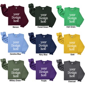 May include: Nine long-sleeved sweatshirts in various colors, including maroon, forest green, Irish green, Carolina blue, navy blue, gold, military green, purple, and charcoal. Each sweatshirt has the text "your design here" printed on the front.