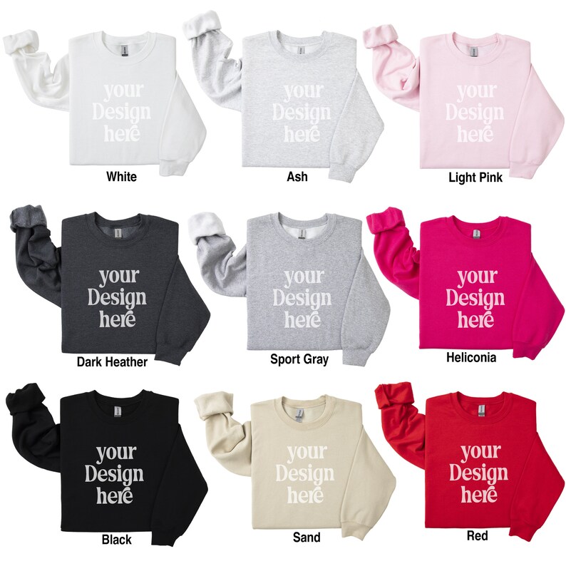 May include: Nine different color sweatshirts with the text "your design here" printed on the front. The colors are white, ash, light pink, dark heather, sport gray, heliconia, black, sand, and red.