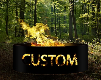 May include: A black metal fire pit with the word "CUSTOM" cut out in the front. The fire pit is surrounded by green trees and a fire is burning inside.