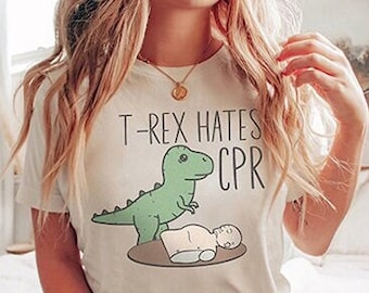 Funny ICU Critical Care Nurse Shirt - T-Rex Hates CPR T-Shirt, ER Ed Emergency Department Rn Tee, Gift for Cpr Instructor Ems Emt Rrt