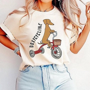 Camiseta de doxiciclina, camisetas divertidas de medicina de farmacia, perro salchicha en bicicleta, camisa Pharm Tech, camiseta veterinaria, regalo de tecnología veterinaria, regalo de farmacéuticos