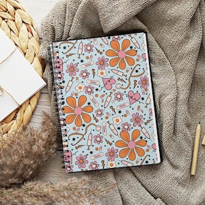 Nurse Doodles Spiral Notebook - Ruled Line - 8x6 in. Note book for Registered Nurse RN Nursing Student Notes Journal Gift Graduation Notes