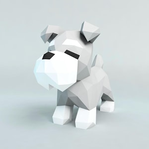 Puede incluir: Una escultura de perro de estilo geométrico y low-poly en tonos grises y blancos. El perro tiene un hocico, patas y pecho blancos, con ojos negros. La escultura está de pie sobre sus cuatro patas, con un fondo gris claro.