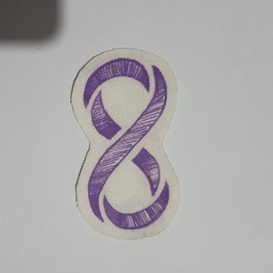 May include: Purple infinity symbol embroidered on a white fabric patch.