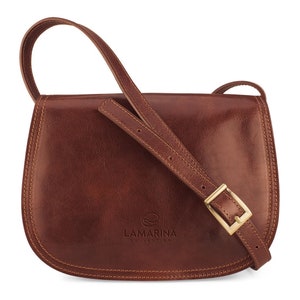 Handcrafted women's bag in leather and leather 100% Made in Italy.