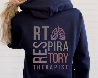 May include: Navy blue hooded sweatshirt with the text "RT RESPIRATORY THERAPIST" and a stylized image of lungs.