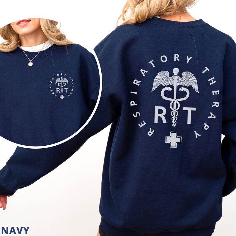 May include: Navy blue sweatshirt with a white graphic on the back that says "Respiratory Therapy" with a medical symbol and the letters "RT".