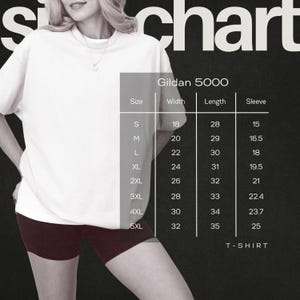 May include: A white Gildan 5000 t-shirt with a size chart. The chart lists sizes S to 5XL, with corresponding measurements for width, length, and sleeve length in inches. The shirt is shown on a person.