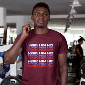 Lock Him Up T-Shirt | Anti-Trump Protest Tee for Men and Women | Political Rally Shirt | Unisex Jersey Short Sleeve Tee