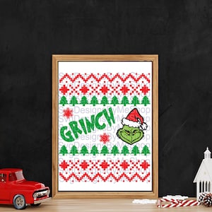 May include: A printable digital download of a Christmas-themed design featuring the Grinch wearing a Santa hat. The design is in a pixelated style and includes the word "Grinch" in green letters.