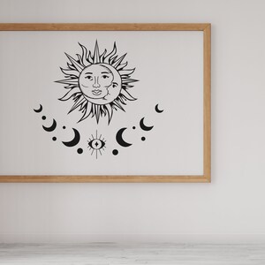 May include: A black and white illustration of a sun and moon with a third eye symbol in the center. The sun and moon are surrounded by crescent moons.