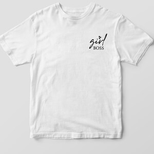 May include: White t-shirt with the text "girl BOSS" in black script.