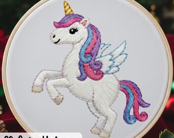 May include: Hand-stitched embroidery of a unicorn with a golden horn, flowing pink, blue, and purple mane and tail, and small white wings. The unicorn is on a white background, framed by a wooden hoop. Text at the bottom reads "30 Cute Unicorn".