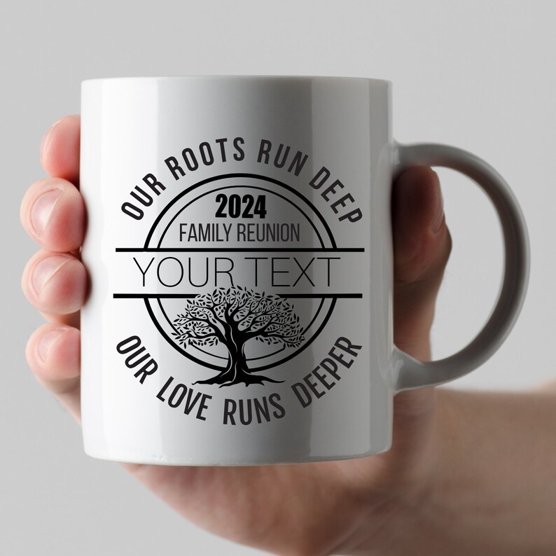 May include: White ceramic mug with a black design that says "Our roots run deep, our love runs deeper". The design also includes a tree, the year 2024, and the words "Family Reunion".
