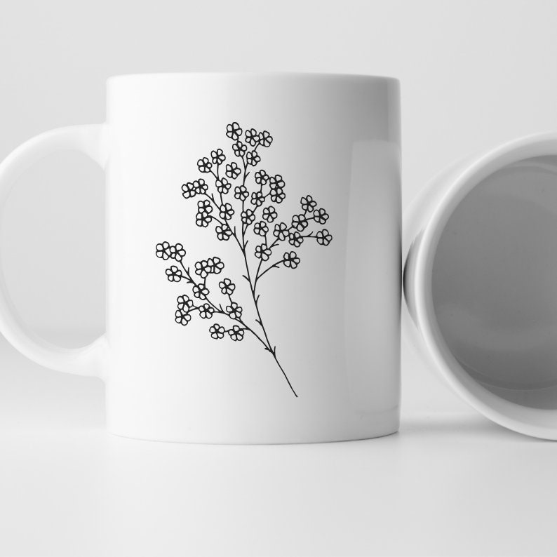 May include: White ceramic mug with a black line drawing of a sprig of small flowers.