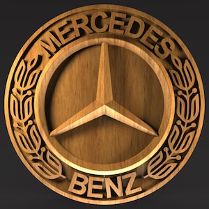 May include: A wooden Mercedes-Benz emblem, featuring the brand's iconic three-pointed star within a circular frame. The words "MERCEDES" and "BENZ" are carved around the emblem's edge, with decorative floral elements. The wood has a natural grain.