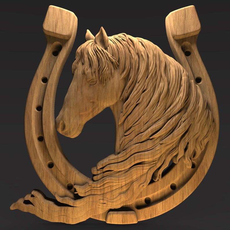 May include: A wooden carving of a horse's head within a horseshoe. The horse's mane and facial features are intricately detailed. The horseshoe has visible nail holes. The carving is made of light-colored wood and set against a dark background.