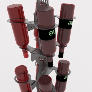 May include: A metal wine bottle drying rack with multiple slots holding red glass bottles. The bottles have black bands with green text. The rack is a dark gray color and has a decorative top.
