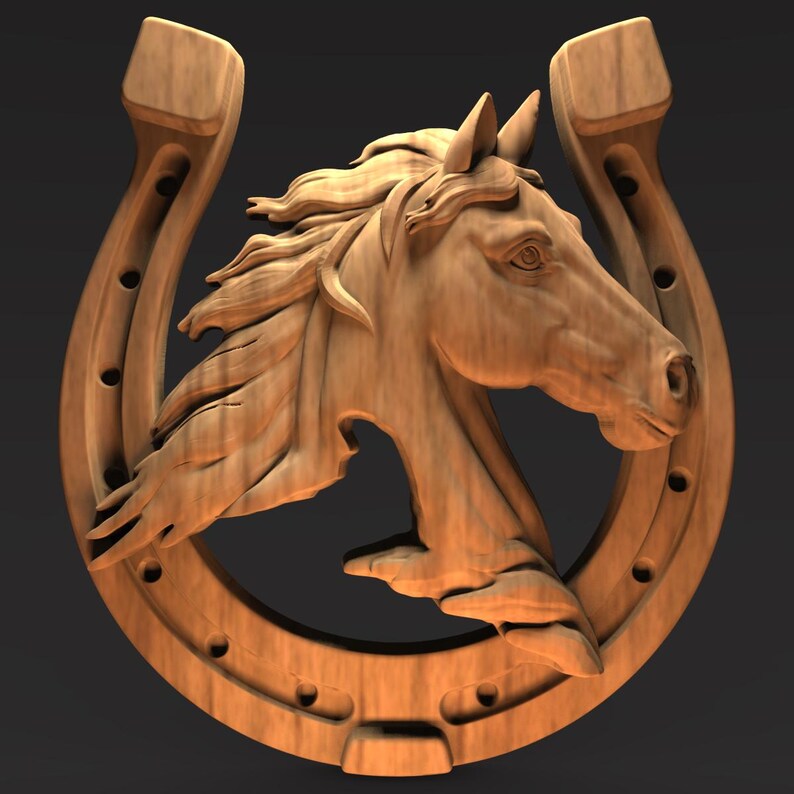 May include: Wooden carving of a horse head within a horseshoe. The horse's mane and facial features are intricately detailed. The horseshoe has visible nail holes. The wood has a warm, natural tone, suggesting a rustic or country theme.