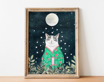 May include: A framed illustration of a cat wearing a green and pink floral robe, sitting under a full moon with stars in the night sky.