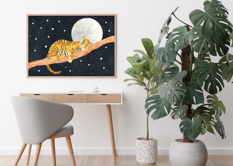 May include: A framed illustration of an orange tiger sleeping on a branch with a full moon and stars in the background.