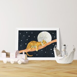 May include: A framed illustration of an orange and black tiger sleeping on a branch with a full moon and stars in the background.