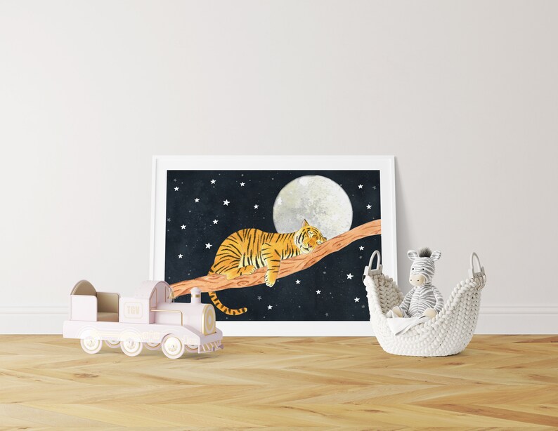 May include: A framed illustration of an orange and black tiger sleeping on a branch with a full moon and stars in the background.