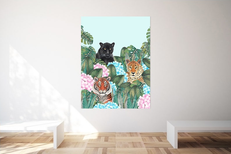 May include: A digital illustration of three wild cats in a jungle setting. A black panther, a tiger, and a leopard are peeking out from behind lush green leaves and pink and blue flowers.