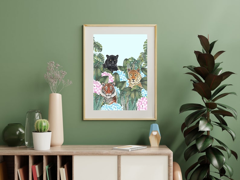 May include: A framed print of a black panther, a tiger, and a leopard in a jungle setting with pink and blue flowers.