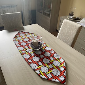 Runner gives away realizzati tavoli with african tessuti
