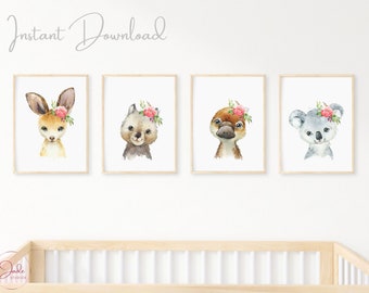 May include: Four printable nursery art prints featuring watercolor illustrations of Australian animals with floral crowns. The animals are a kangaroo, a wombat, a platypus, and a koala.